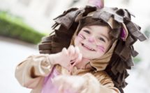 girl dressed up in lion costume