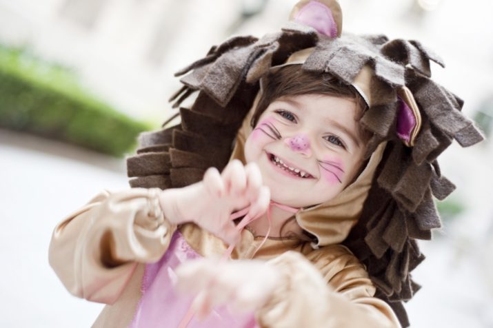 girl dressed up in lion costume
