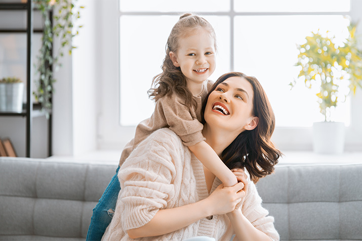 mom and daughter playing together