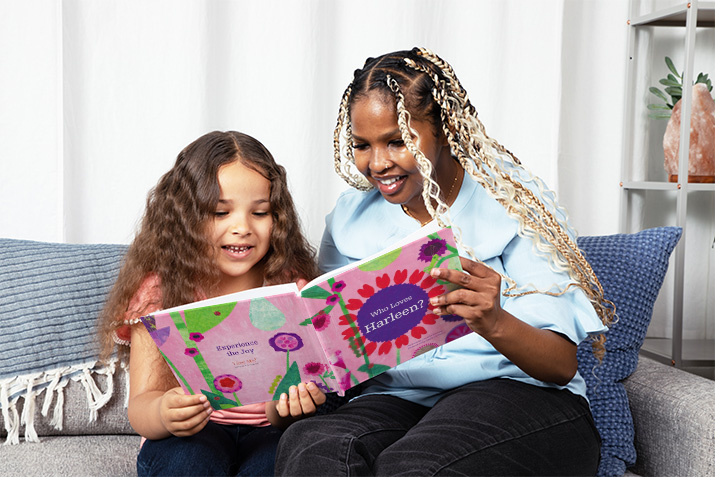 Mom and daughter reading a personalized Valentine's Day book
